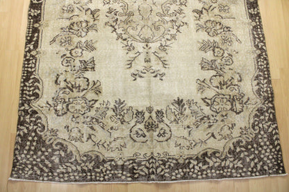 Hand-Knotted Vintage Turkish Rug (5'6" x 9'4")